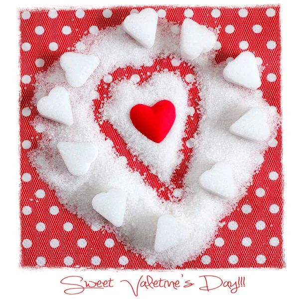 Srdce v cukru na červeném pozadí. valentinky symbol — Stock fotografie