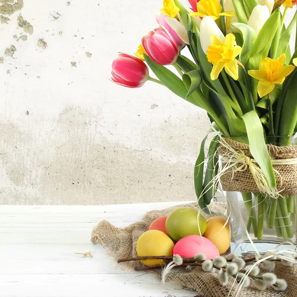 Vase of Tulips and easter eggs — Stock Photo, Image