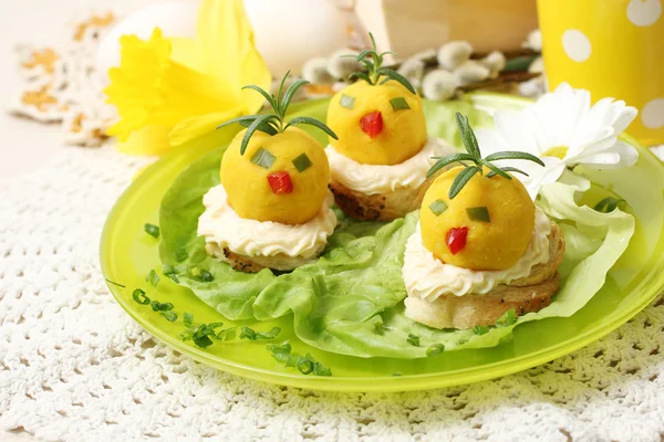 Easter breakfast. Chickens made from egg yolk with mayonnaise pu — Stock Photo, Image