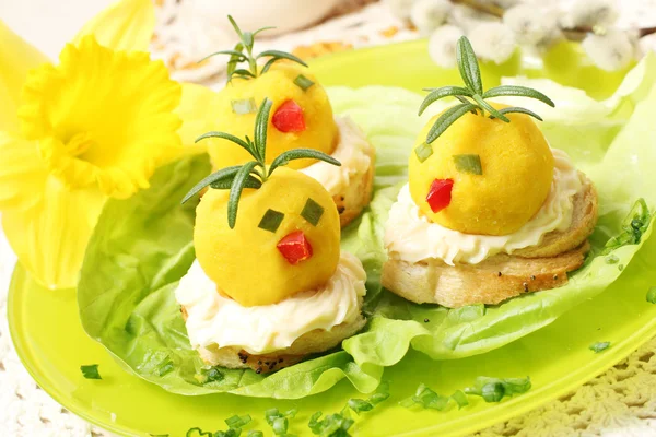Easter breakfast. Chickens made from egg yolk with mayonnaise pu — Stock Photo, Image