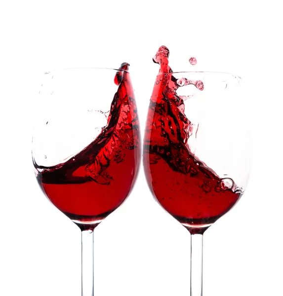 Vin rouge éclaboussure dans deux verres Image En Vente