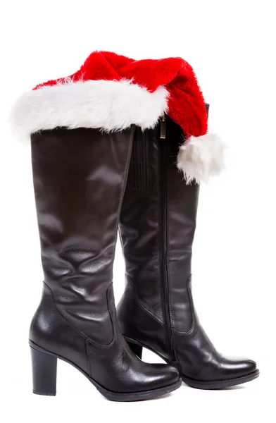 Czarne buty z santa hat — Zdjęcie stockowe