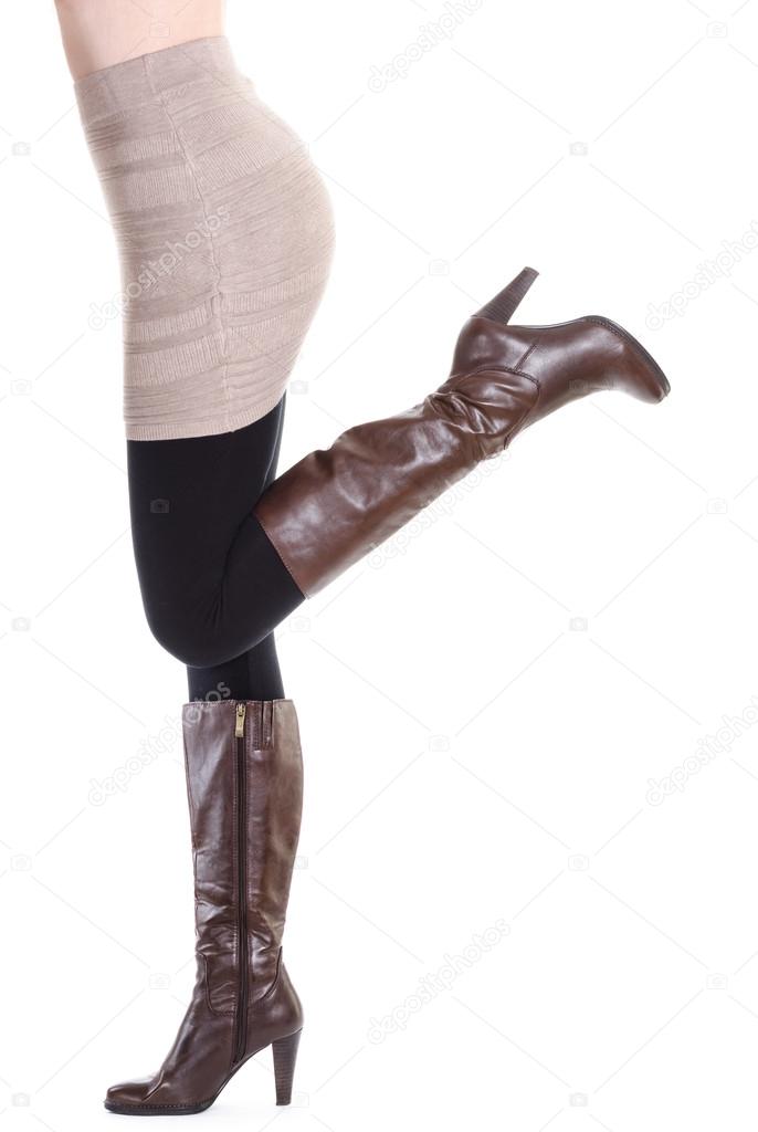 Sexy woman in brown boots - moving up