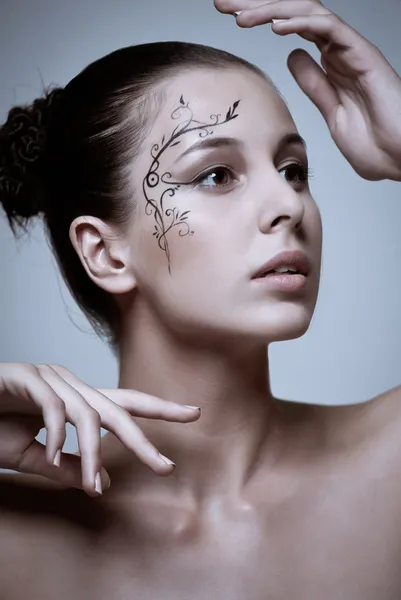 Moda makijaż z twarzy sztuki. — Zdjęcie stockowe