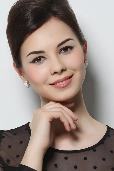 Portret van een mooi meisje met make-up — Stockfoto