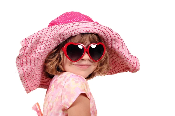 Little girl with hat and sunglasses portrait — Stockfoto