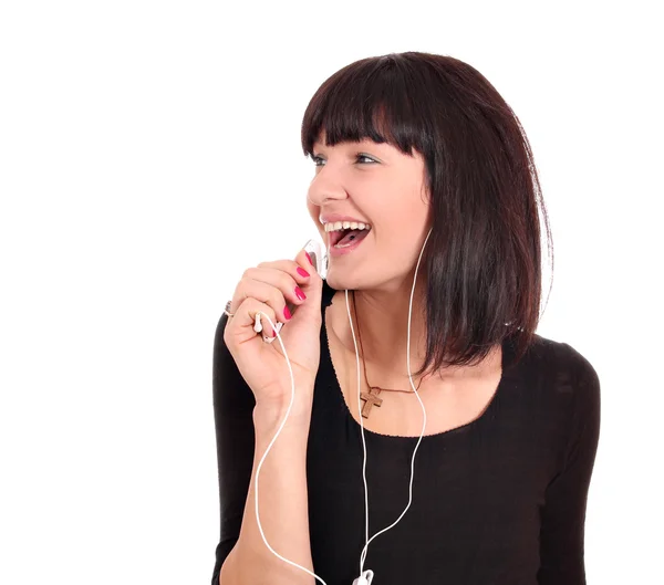 Happy girl listening music and sing — Stock Photo, Image