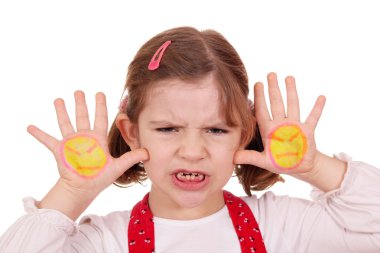 Angry little girl with angry smiley on hands clipart