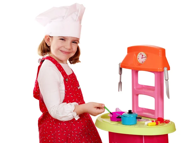 Beautiful little girl play cooking — Stock Photo, Image