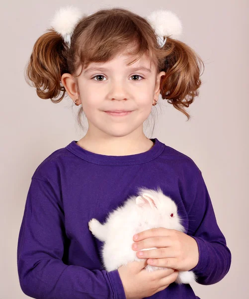 Little girl with white bunny portrait — Stock Photo, Image