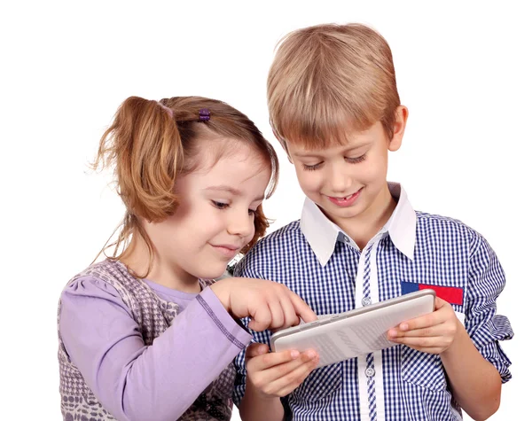 Little girl and boy fun with tablet pc on white — Stock Photo, Image