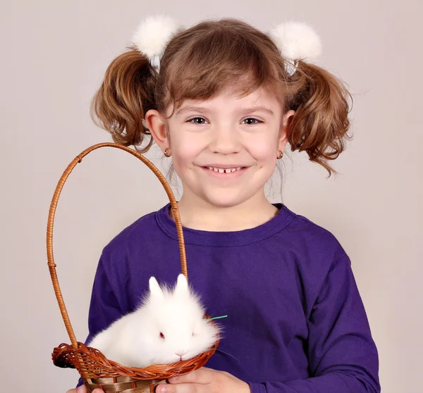 Beautiful little girl and white dwarf bunny pet — Stock Photo, Image