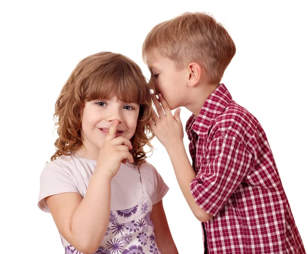 Boy whispering a secret little girl — Stock Photo, Image