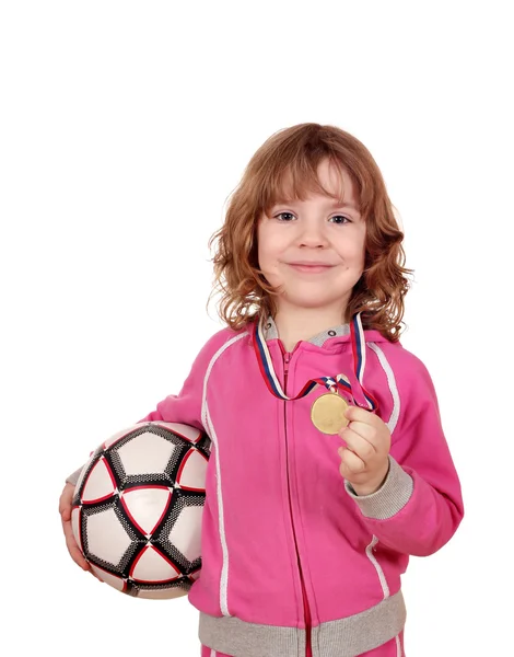 Glückliches kleines Mädchen mit Goldmedaille und Fußball — Stockfoto