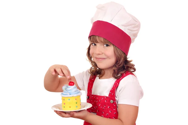Belle petite fille avec cupcake sucré — Photo