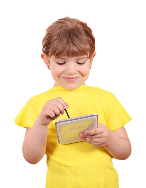Malá holčička hrát s tabletem na bílém pozadí — Stock fotografie