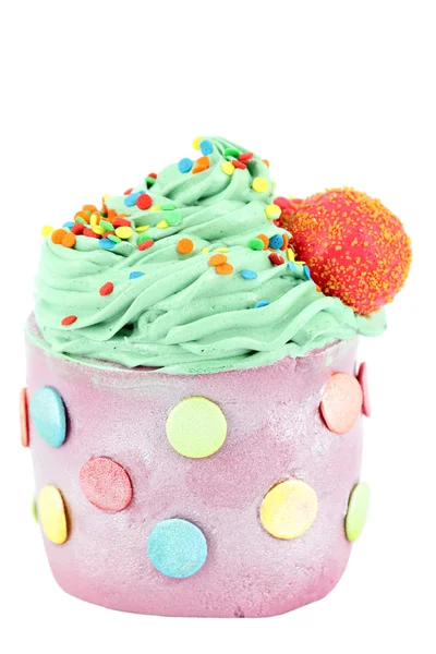 Cupcake met lolly dessert op wit — Stockfoto