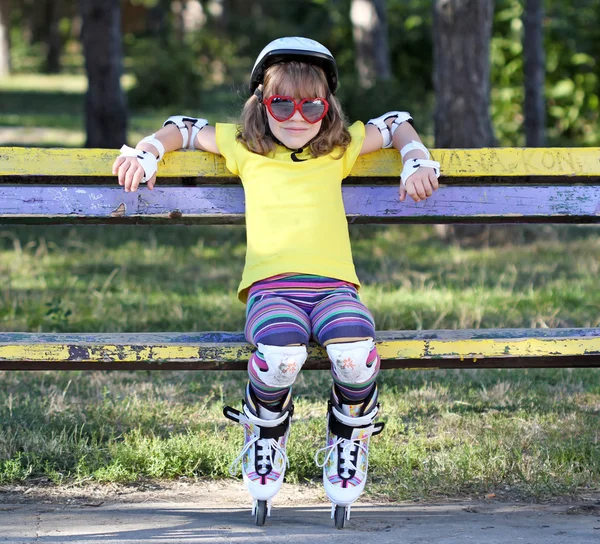 Little girl with sunglasses and roller skates — Stock Photo, Image