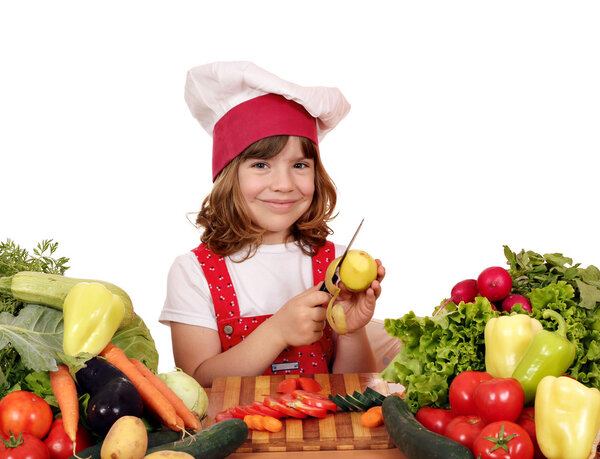 little girl cook peeling potatoes