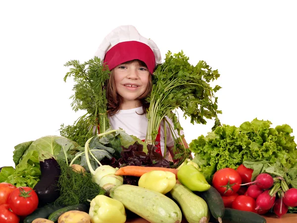 Bela menina cozinheiro com legumes diferentes — Fotografia de Stock