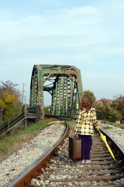 Little girl walking on railroad — Stock Photo, Image