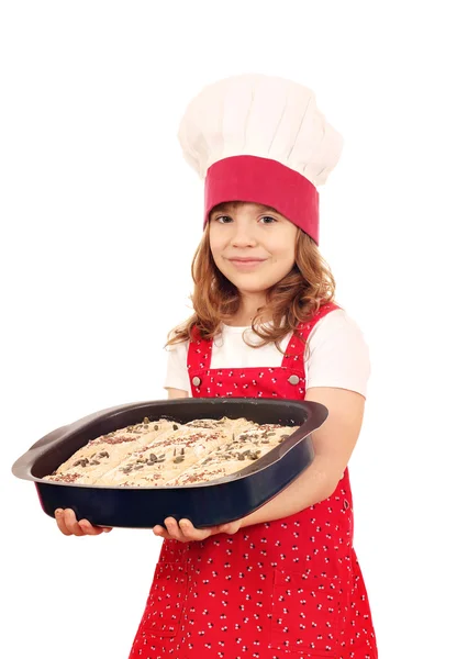 Little girl cook hold plate with bread — Stock Photo, Image