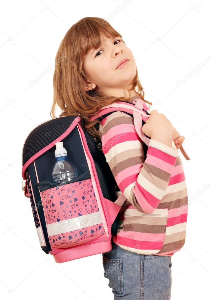 little girl carrying a heavy school bag