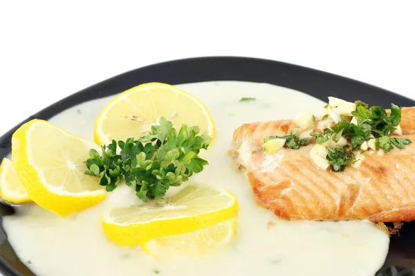 Salmon with sauce and lemon — Stock Photo, Image