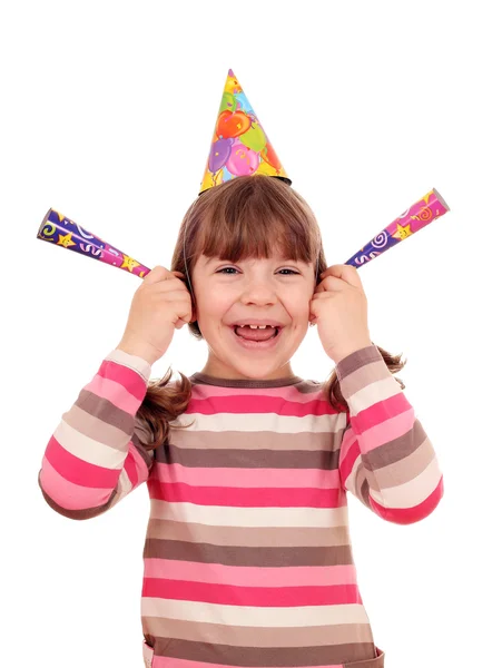 Boldog kis lány trombita és kalap születésnapi party — Stock Fotó