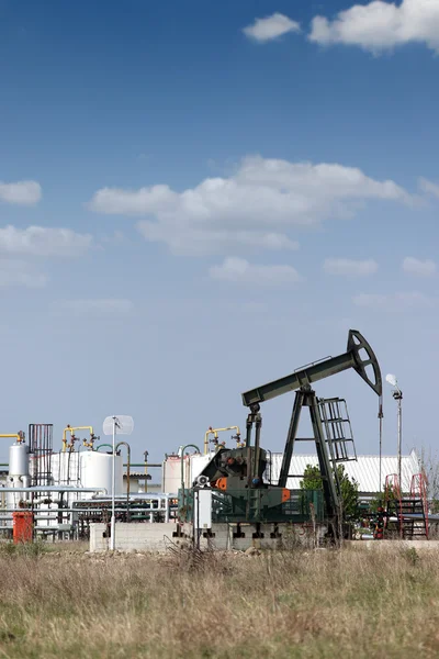 Refinery and oil pump jack oilfield — Stock Photo, Image