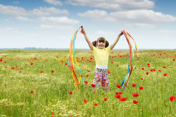 Beautiful little girl on meadow — Stock Photo, Image