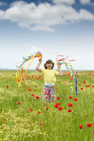 Beautiful little girl on meadow — Stock Photo, Image