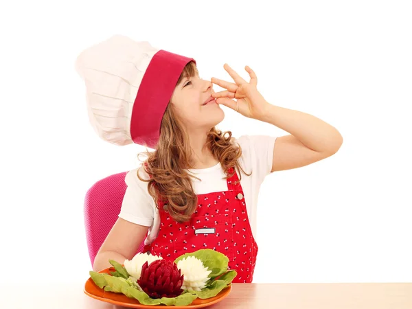 Little girl cook with decorated salad and ok hand sign — Stock Photo, Image