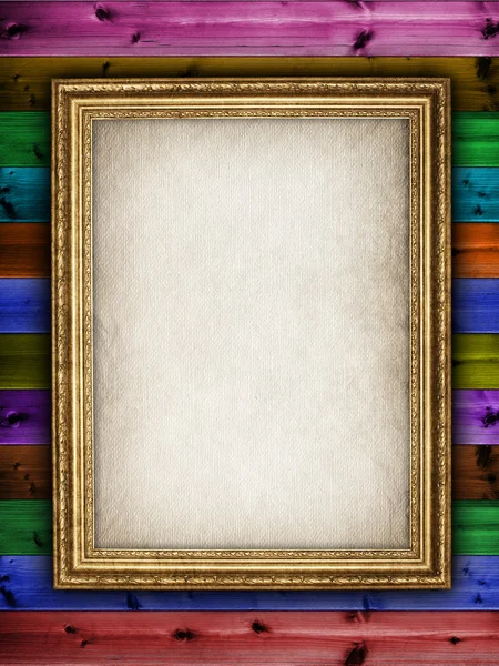 Picture frame on colorful wooden background — Stock Photo, Image