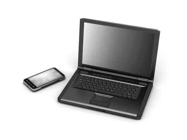 Laptop en mobiele telefoon — Stockfoto