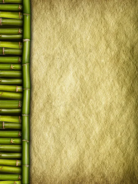 Hoja de papel y palos de bambú hechos a mano arrugados —  Fotos de Stock