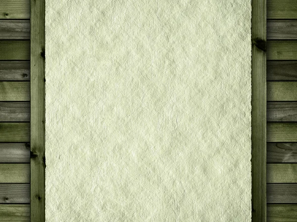 Gevouwen papier blad op houten planken — Stockfoto