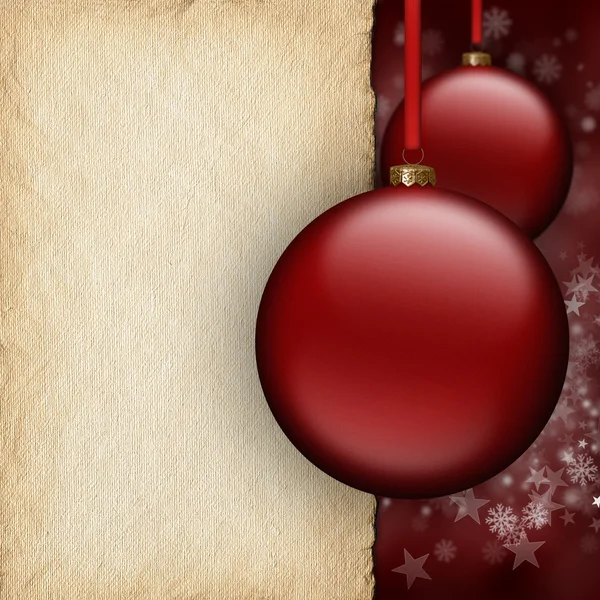 Sfondo di Natale - bagattelle rosse e foglio di carta bianco — Foto Stock