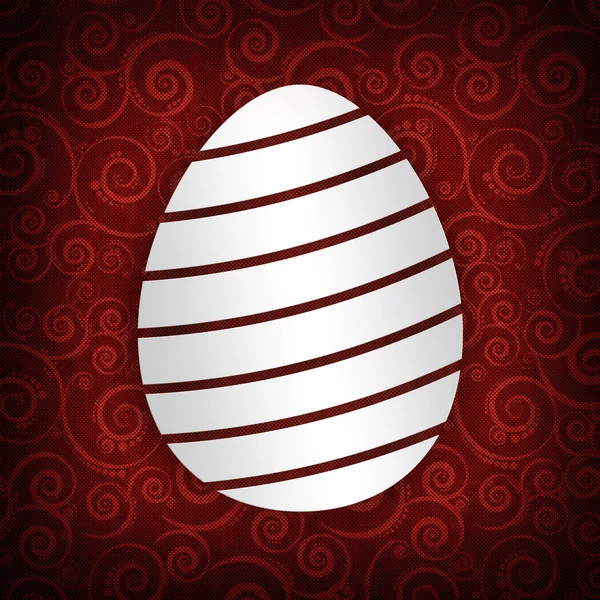 Ovo de Páscoa branco no fundo vermelho — Fotografia de Stock