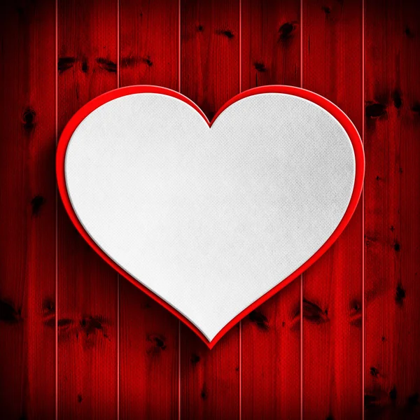 White heart on red wooden background — Stock Photo, Image