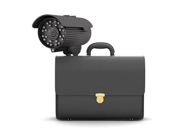 Surveillance video camera and business briefcase — Stock Photo, Image