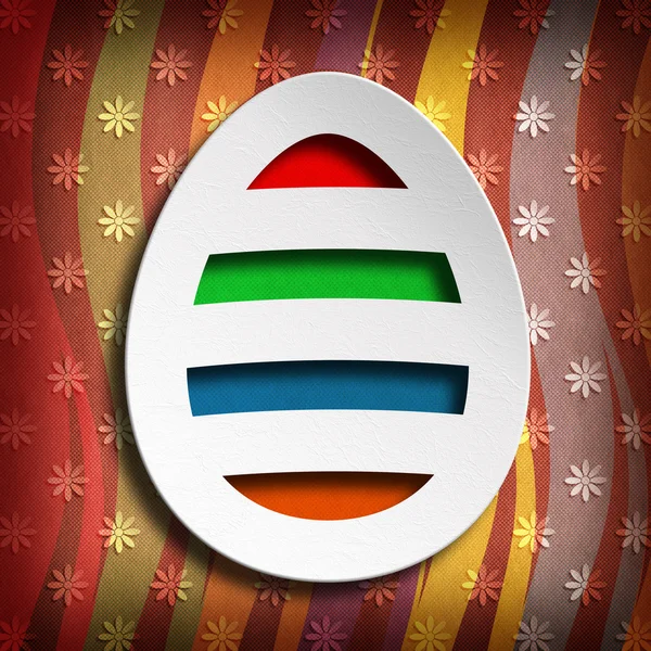 Barevné velikonoční vajíčko na vzorované pozadí — Stock fotografie