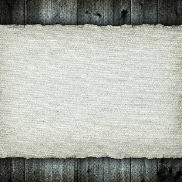 Folha de papel artesanal em pranchas de madeira fundo — Fotografia de Stock