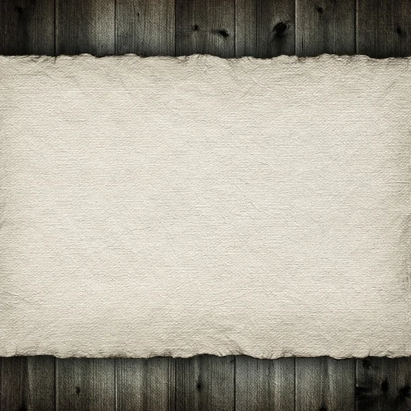 Handmade paper sheet on wooden planks background — Stock Photo, Image