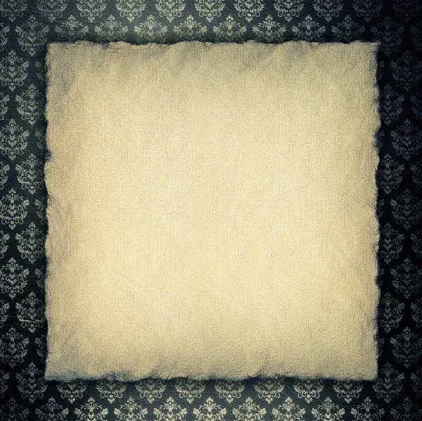 Folha de papel em branco sobre fundo papel de parede — Fotografia de Stock