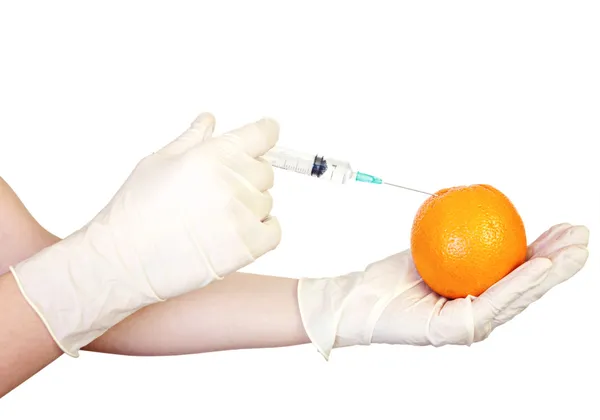 Injection into orange — Stock Photo, Image