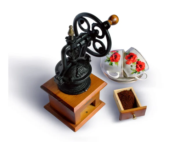 Still life with an ancient coffee grinder — Stock Photo, Image