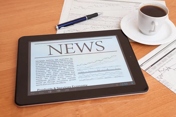 News on digital tablet. — Stock Photo, Image