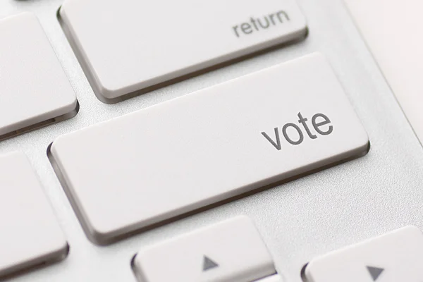 Кнопка голосования — стоковое фото