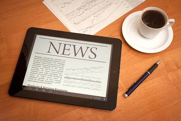 News on digital tablet. — Stock Photo, Image